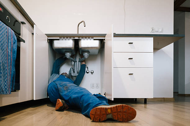 Professional Drain Cleaning technician working in Walker, LA